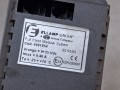 20473, Zegar autobusowy wyświetlający czas, ELLAMP 4991054, TEMSA SAFARI, kostka 4 PINy, widoczne pęknięcie na środku zegara (1).jpg