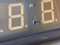 20473, Zegar autobusowy wyświetlający czas, ELLAMP 4991054, TEMSA SAFARI, kostka 4 PINy, widoczne pęknięcie na środku zegara (4).jpg